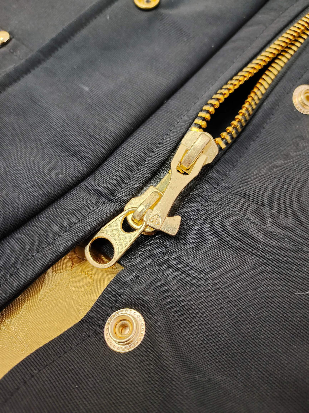 Moose Knuckles Black Hooded Long Parka with Gold-Tone Details