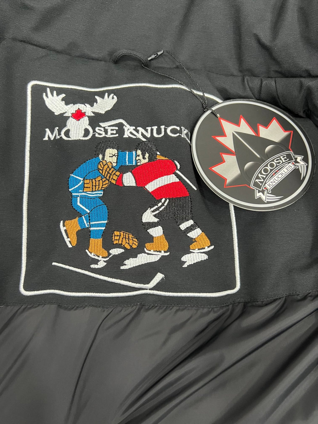 Moose Knuckles Black Hooded Parka with Textured Trim