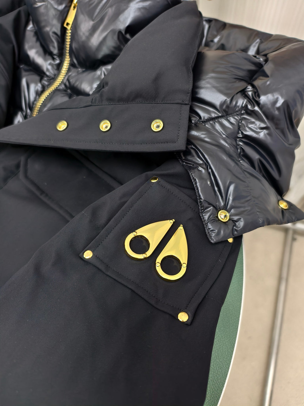Moose Knuckles Black Hooded Jacket with Gold-Tone Hardware