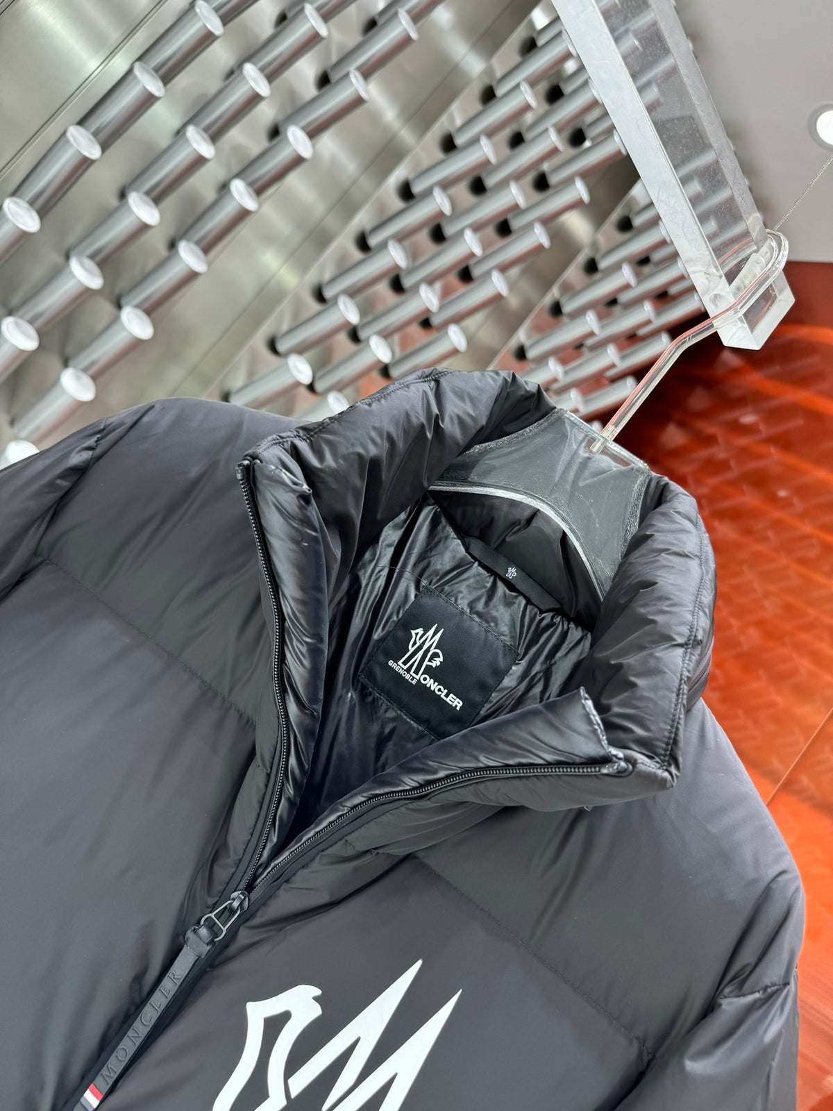 Moncler Black High-Collar Puffer Jacket with Graphic Back Print