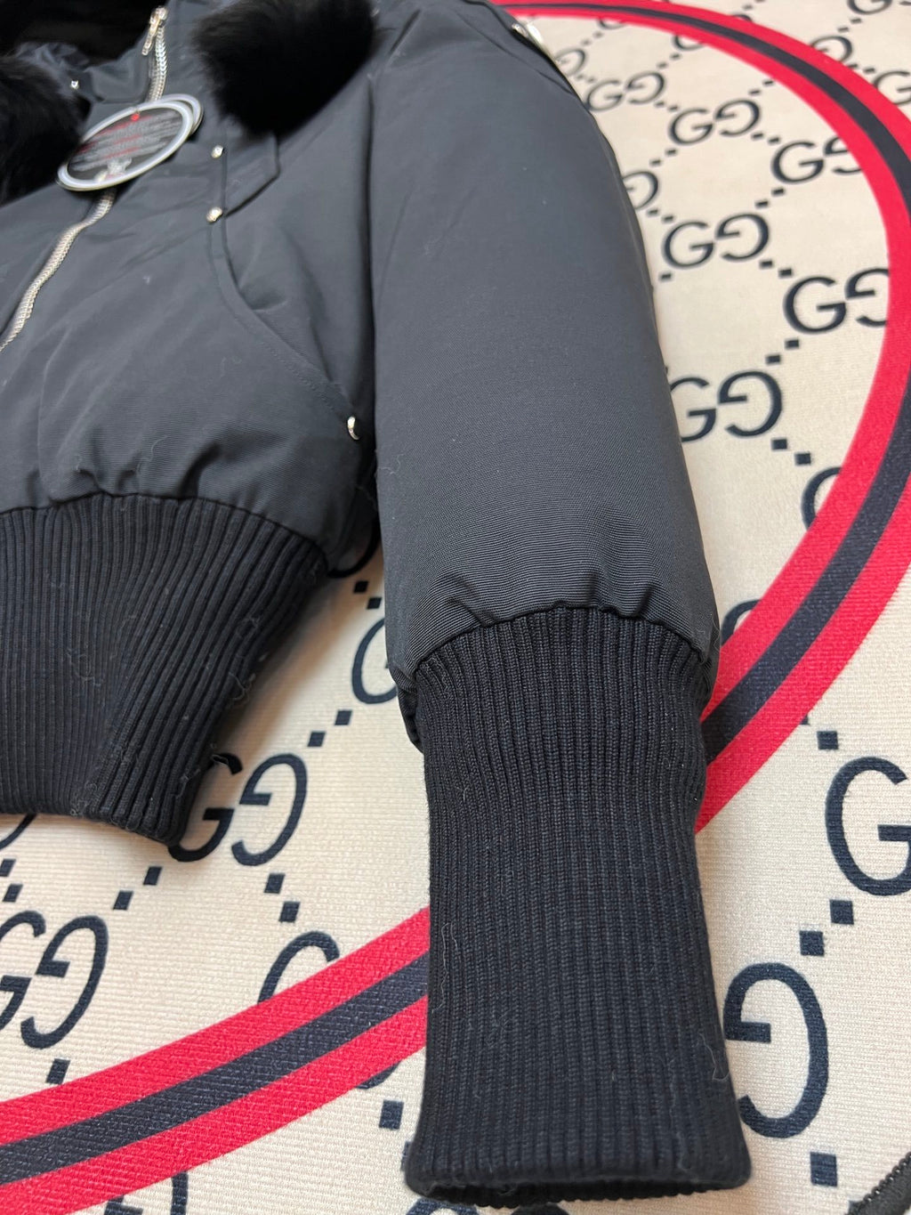 Moose Knuckles Black Hooded Bomber Jacket with Pom-Pom Details