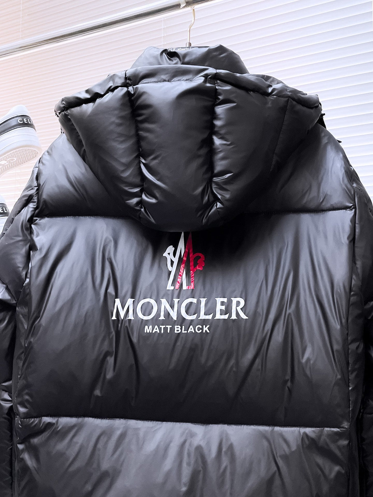 Moncler Black Hooded Puffer Jacket with Red and White Chest Logo
