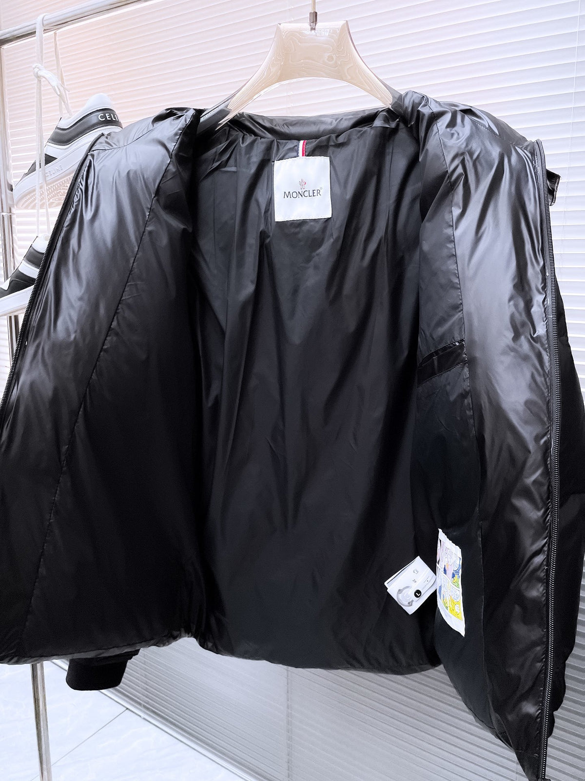 Moncler Black Hooded Puffer Jacket with Red and White Chest Logo