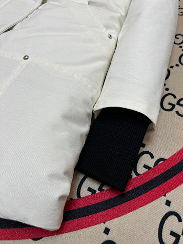Moose Knuckles White Hooded Parka with Pom-Pom Details