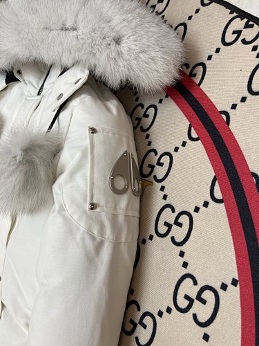 Moose Knuckles White Hooded Parka with Pom-Pom Details
