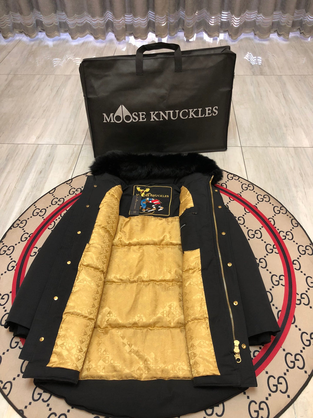 Moose Knuckles Black Long Hooded Parka with Gold-Tone Details