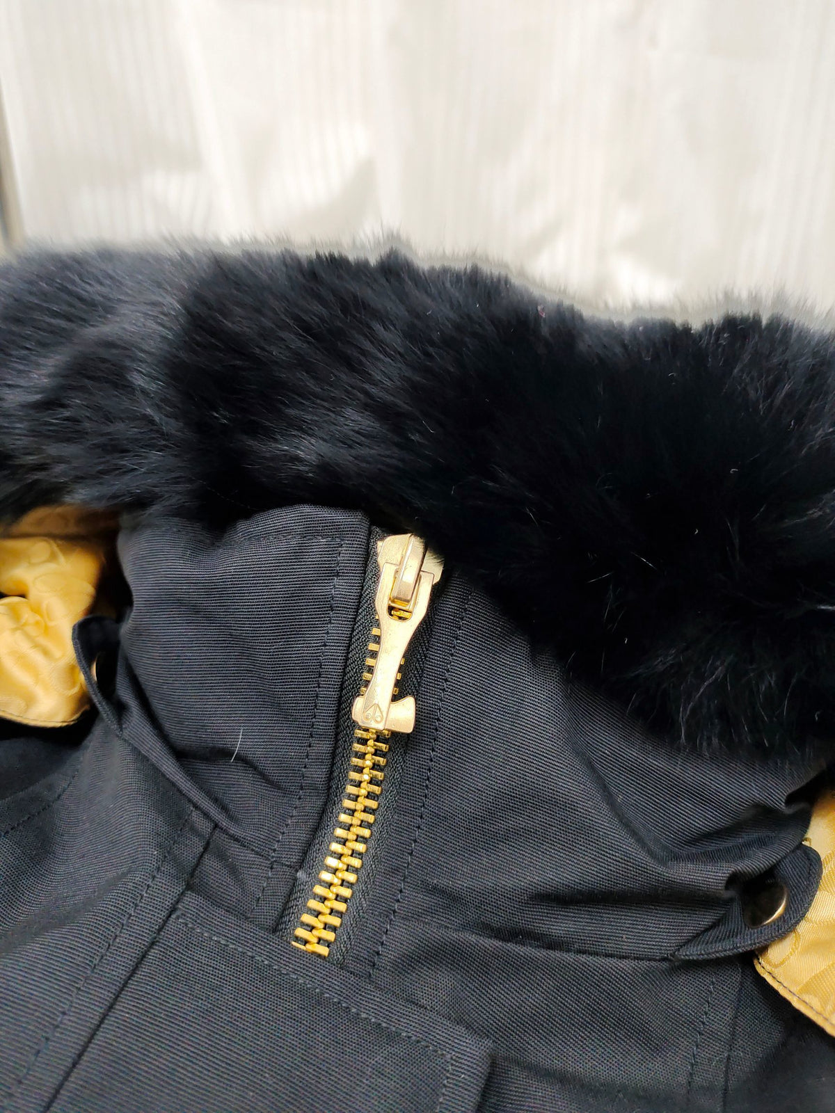 Moose Knuckles Black Hooded Long Parka with Gold-Tone Details