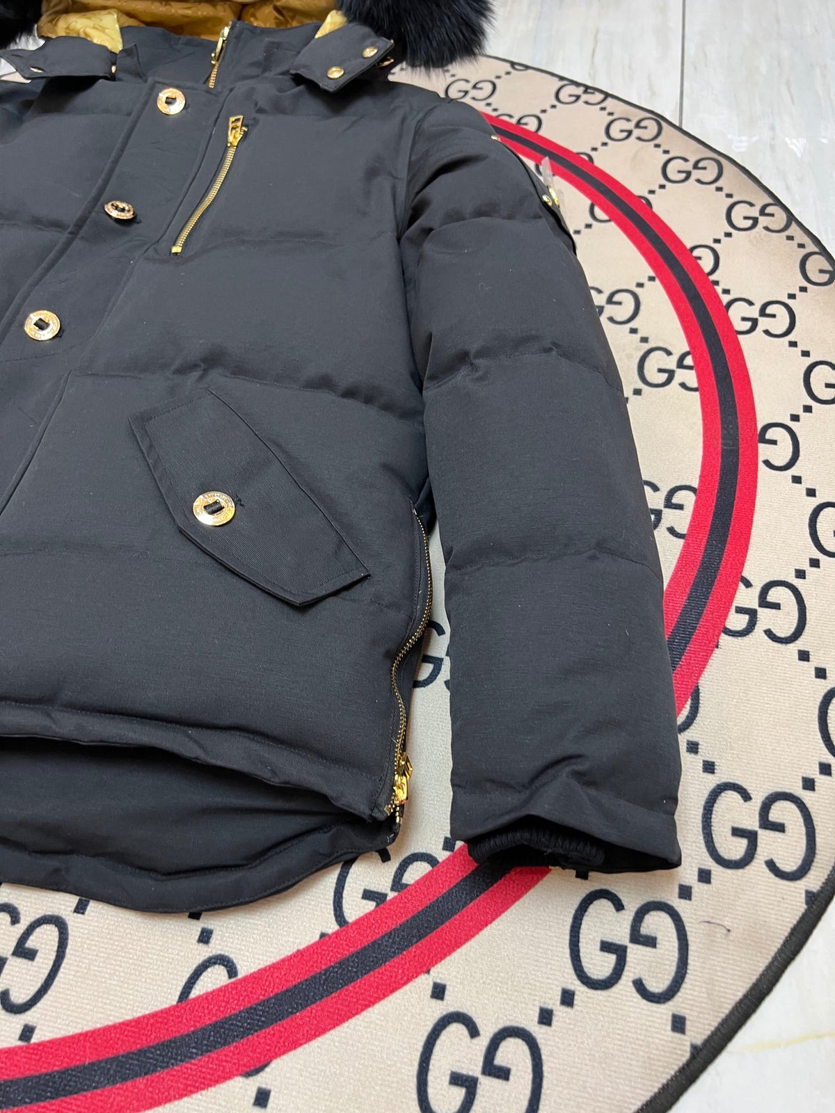 Moose Knuckles Black Hooded Puffer Jacket with Gold-Tone Details