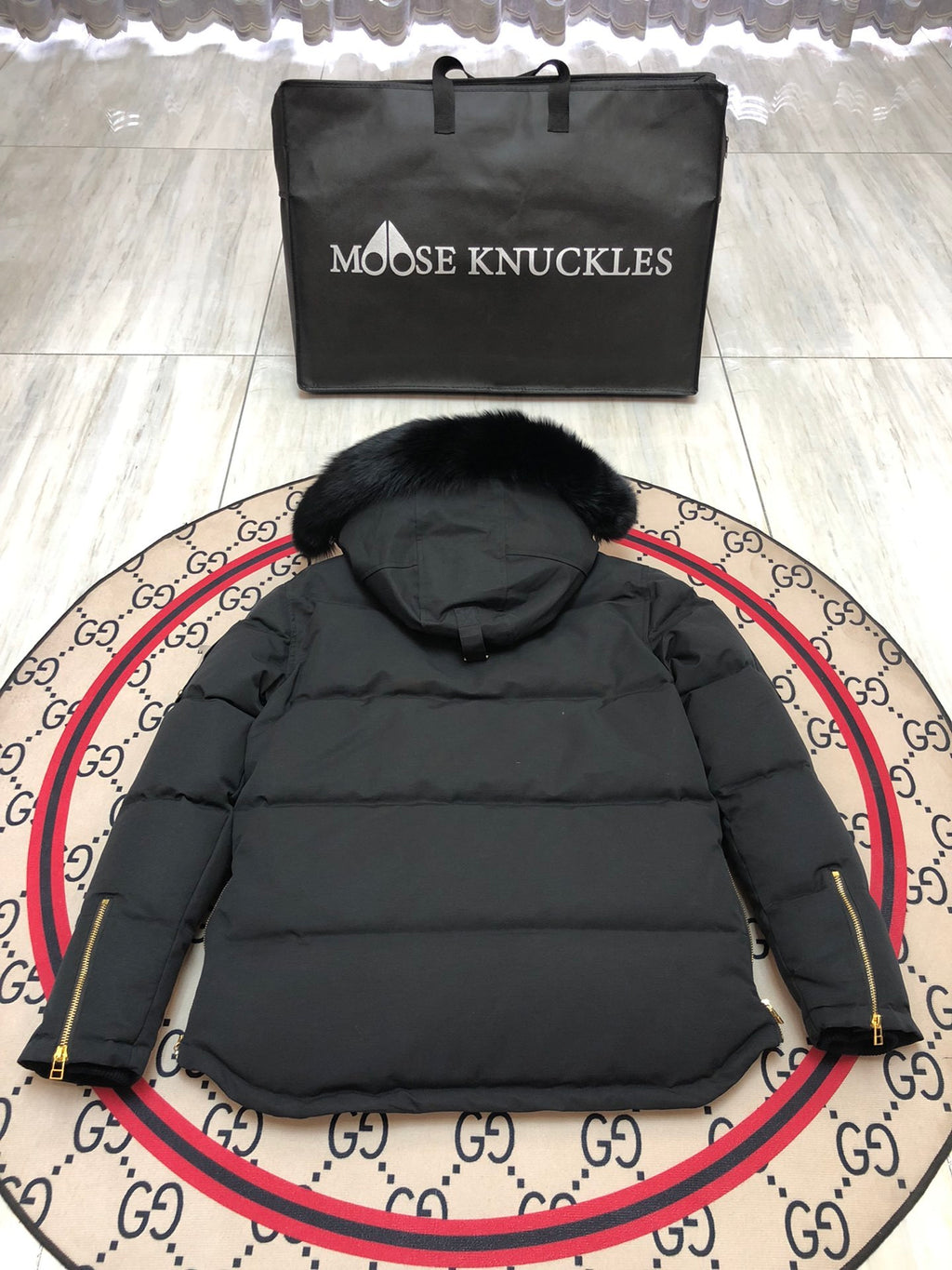 Moose Knuckles Black Hooded Puffer Jacket with Gold-Tone Details
