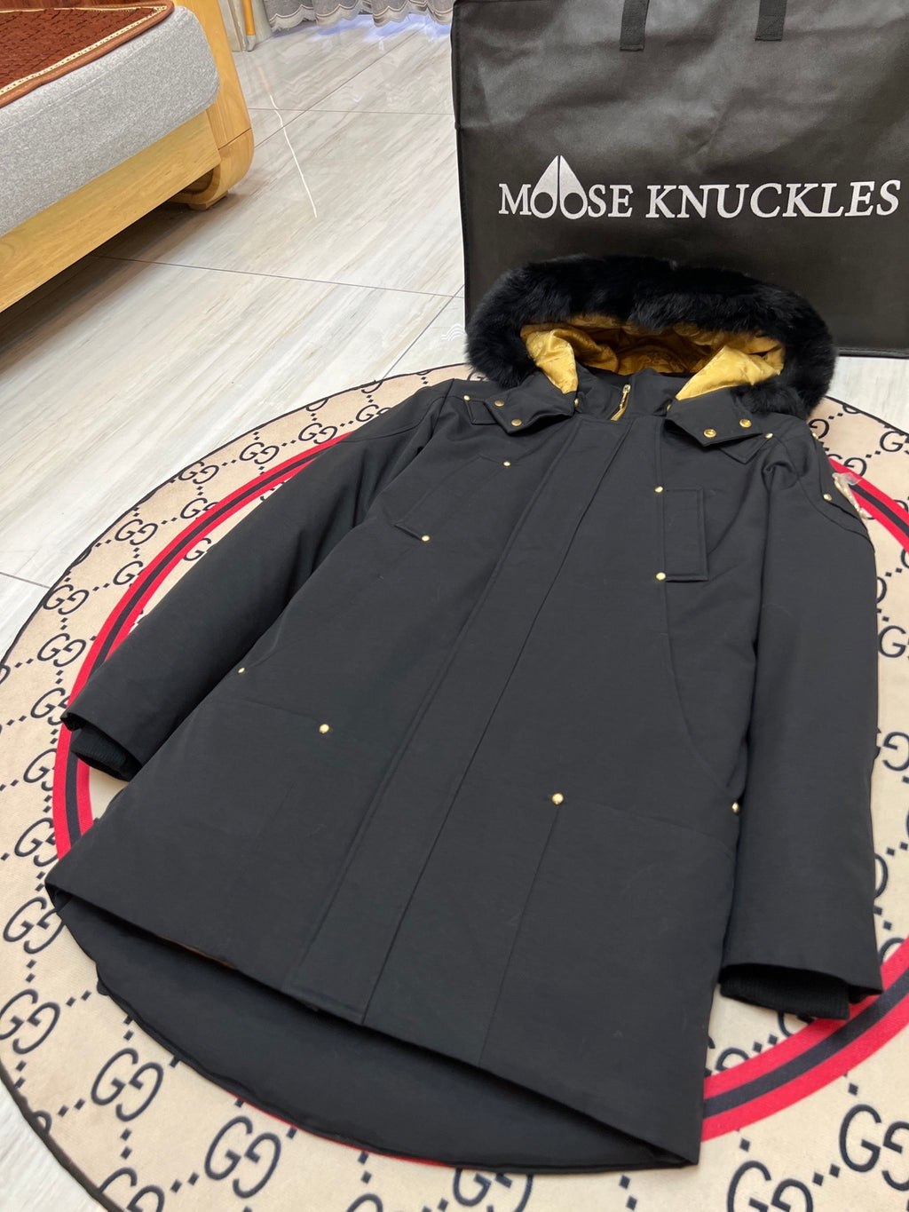 Moose Knuckles Black Long Hooded Parka with Gold-Tone Details