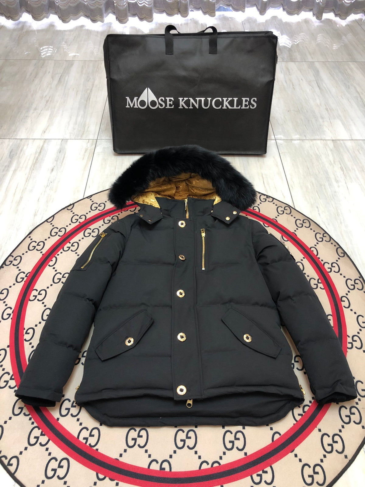 Moose Knuckles Black Hooded Puffer Jacket with Gold-Tone Details