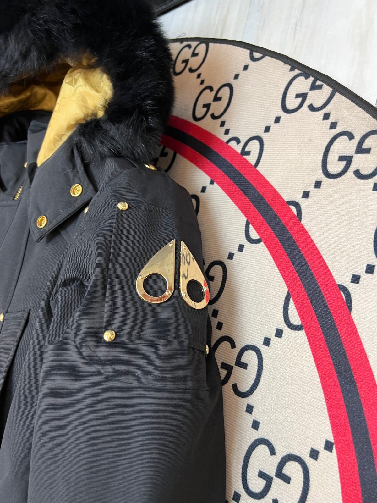Moose Knuckles Black Long Hooded Parka with Gold-Tone Details