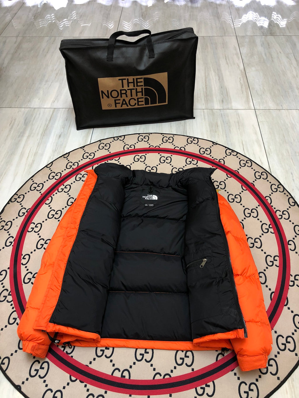 The North Face Men's Orange & Black Colorblock Puffer Jacket