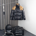 Moncler Black Glossy Puffer Jacket with Gold Contrast Details