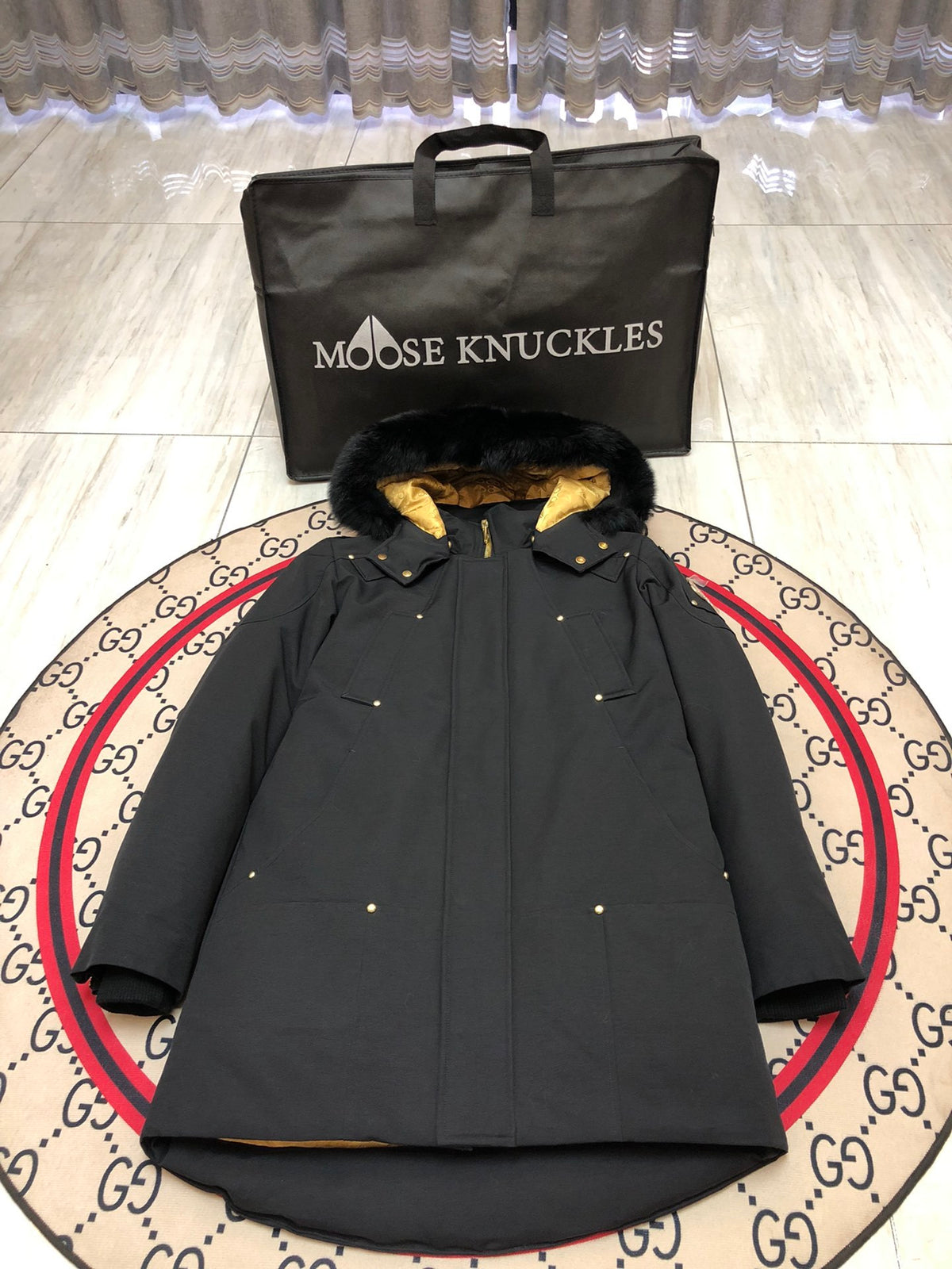 Moose Knuckles Black Long Hooded Parka with Gold-Tone Details