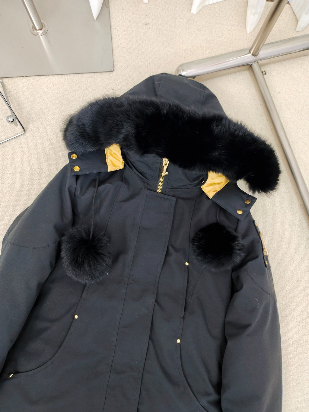 Moose Knuckles Black Hooded Long Parka with Gold-Tone Details