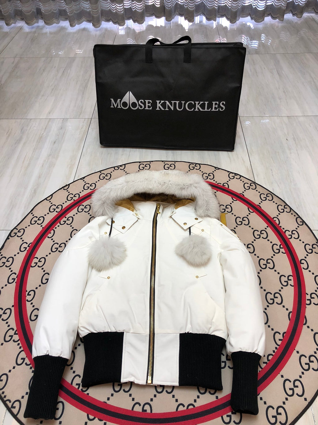 Moose Knuckles White Hooded Bomber Jacket with Black Ribbed Trim