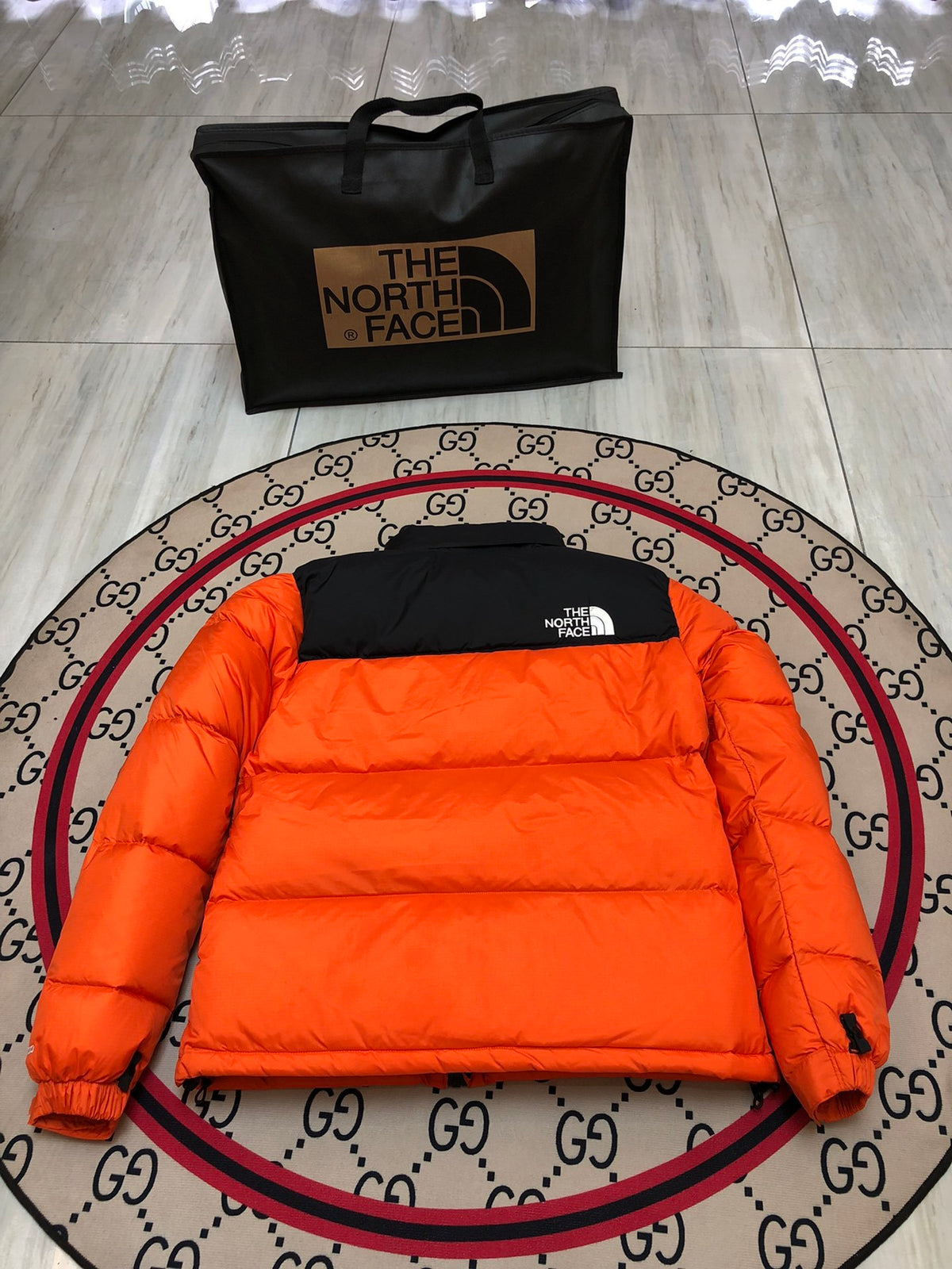 The North Face Men's Orange & Black Colorblock Puffer Jacket
