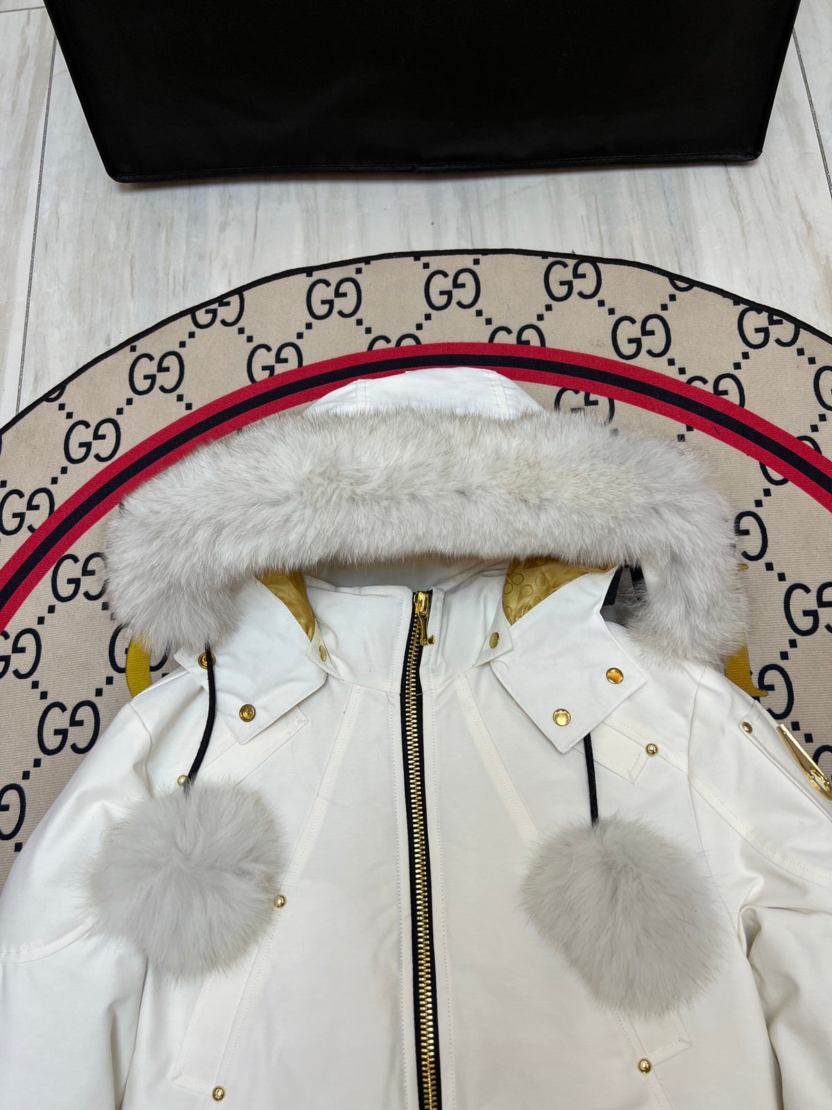 Moose Knuckles White Hooded Bomber Jacket with Black Ribbed Trim