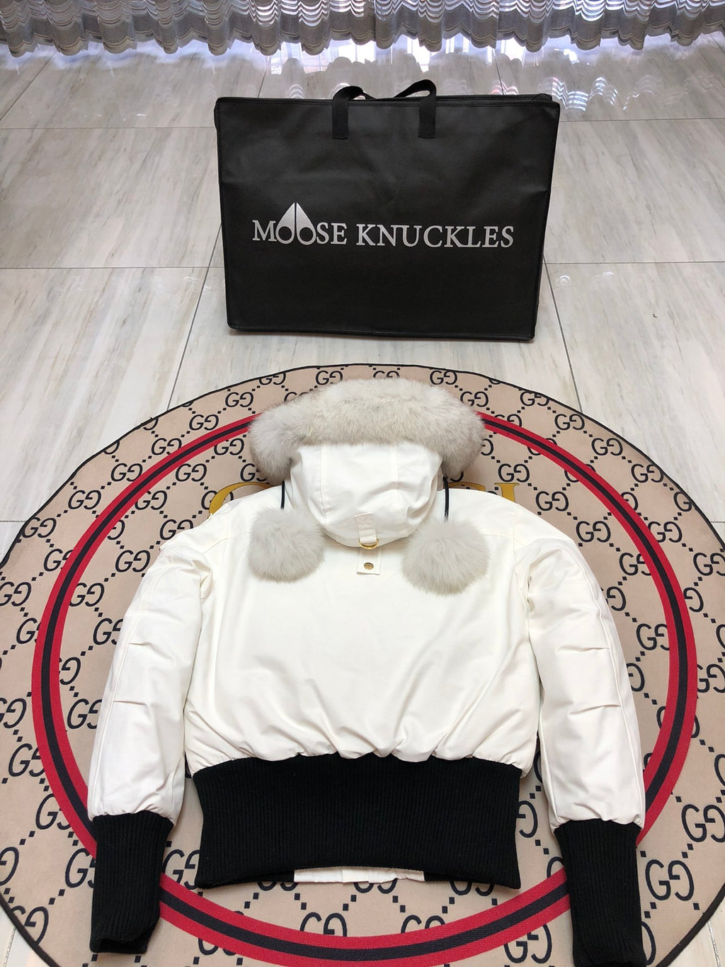 Moose Knuckles White Hooded Bomber Jacket with Black Ribbed Trim