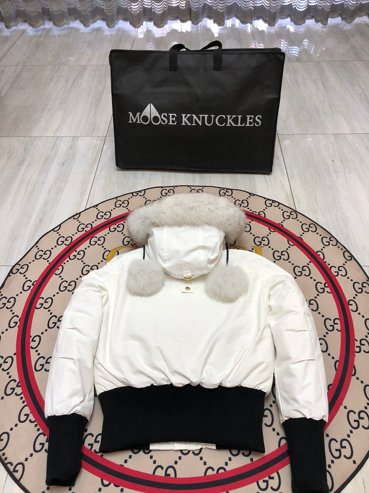 Moose Knuckles White Hooded Bomber Jacket with Black Ribbed Trim
