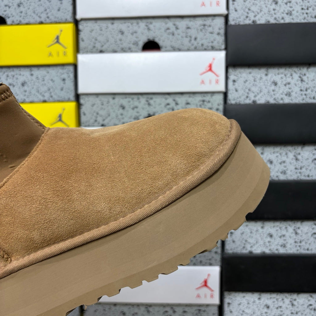 UGG Classic Mini Weather Hybrid Women's Boot – Suede & Stretch Collar Ankle Boot with Orange Pull Loop, UGG SugrSole & Weather-Resistant Construction in Wheat