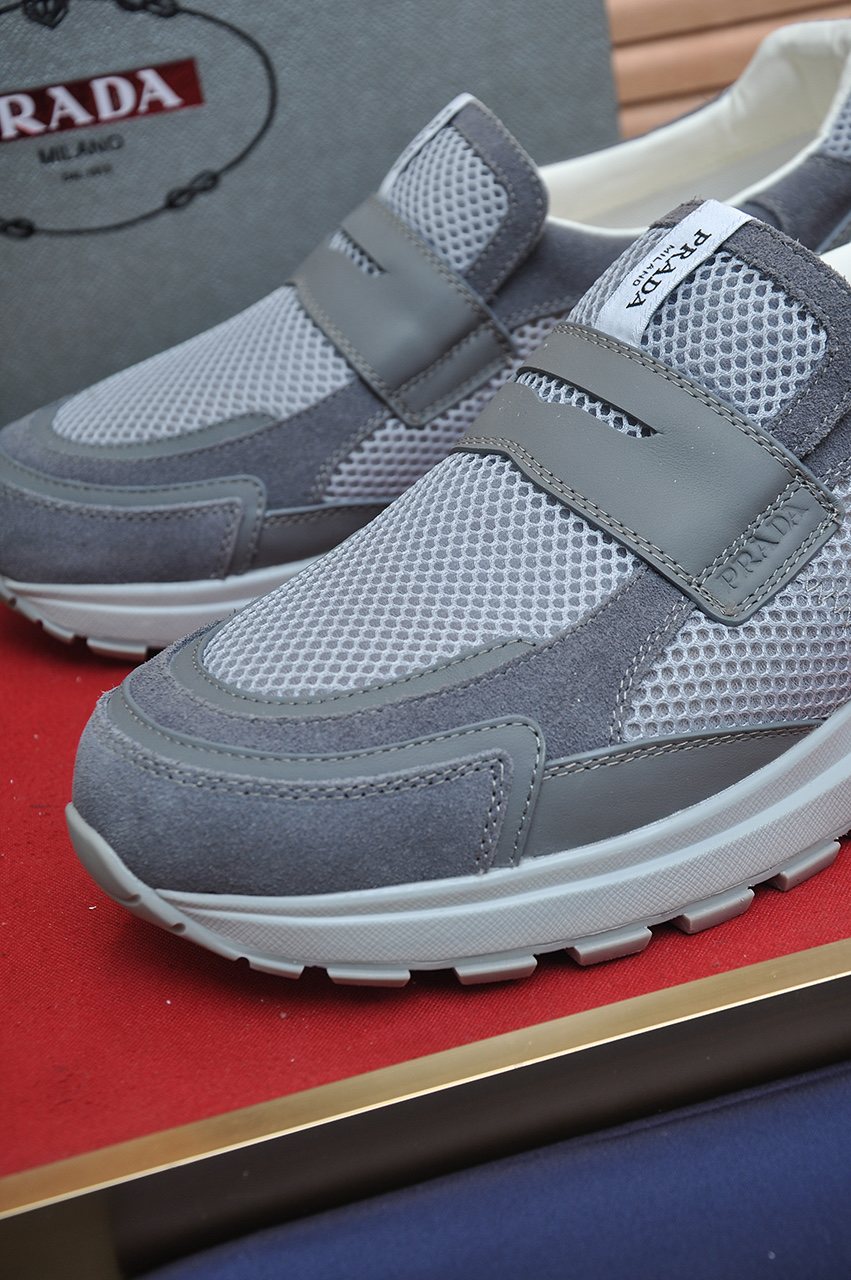 Prada Gray Strap Slip-On Sneakers